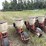 lilliston-8-row-planter-with-fiberglass-boxes,-been-sitting,-some-rust,-boxes-turn-free,-discs-need-loosened-up-image-7