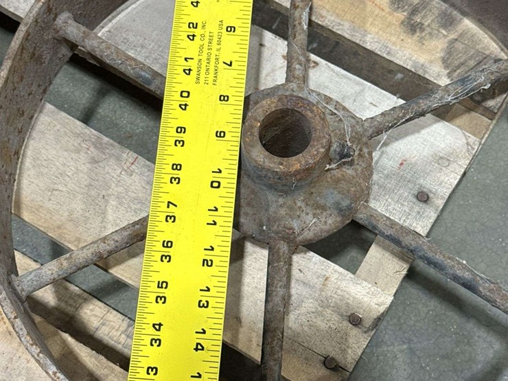 salvaged-cast-iron-wheels-of-varying-sizes-image-21