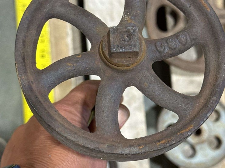 salvaged-cast-iron-wheels-of-varying-sizes-image-16
