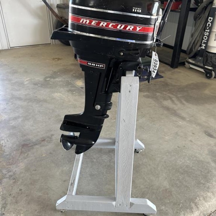 #3934 • MERCURY 9.9 HP OUTBOARD MOTOR WITH STAND