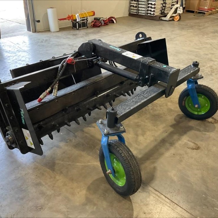 #1412 • Unused Future Skid Steer Power Rake