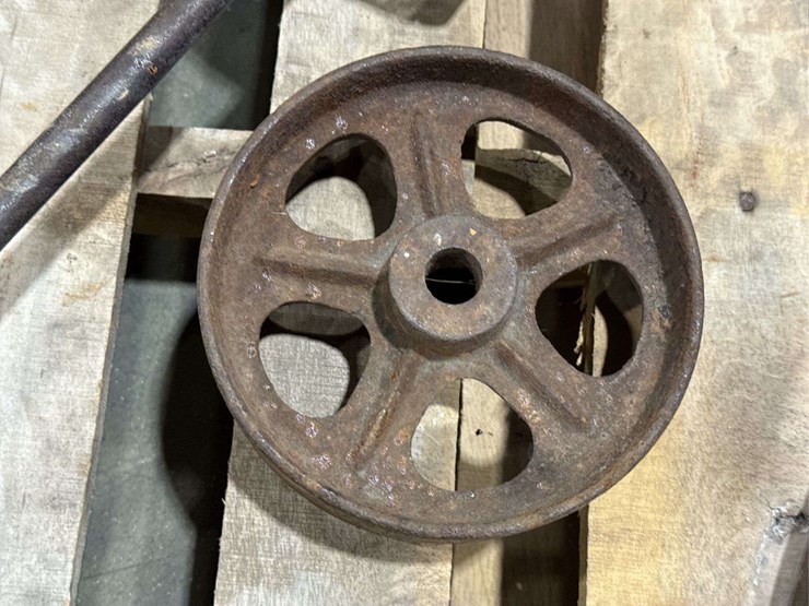 salvaged-cast-iron-wheels-of-varying-sizes-image-11