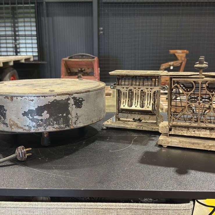 Two Antique Toasters with a Spin Table