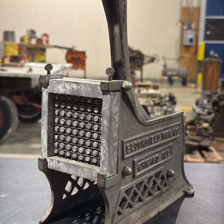 Bloomfield cast iron French fry cutter.