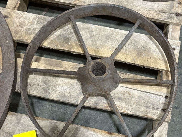 salvaged-cast-iron-wheels-of-varying-sizes-image-20
