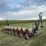 lilliston-8-row-planter-with-fiberglass-boxes,-been-sitting,-some-rust,-boxes-turn-free,-discs-need-loosened-up-image-1