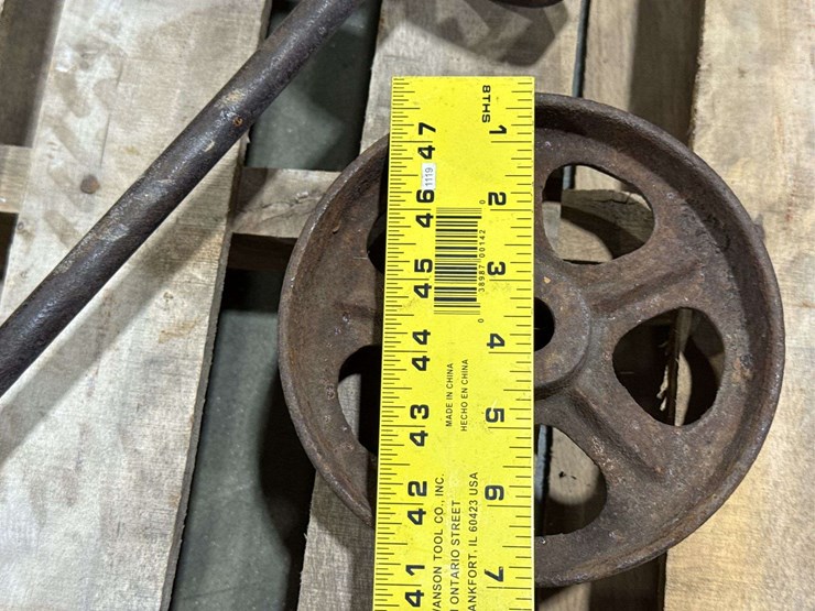 salvaged-cast-iron-wheels-of-varying-sizes-image-10