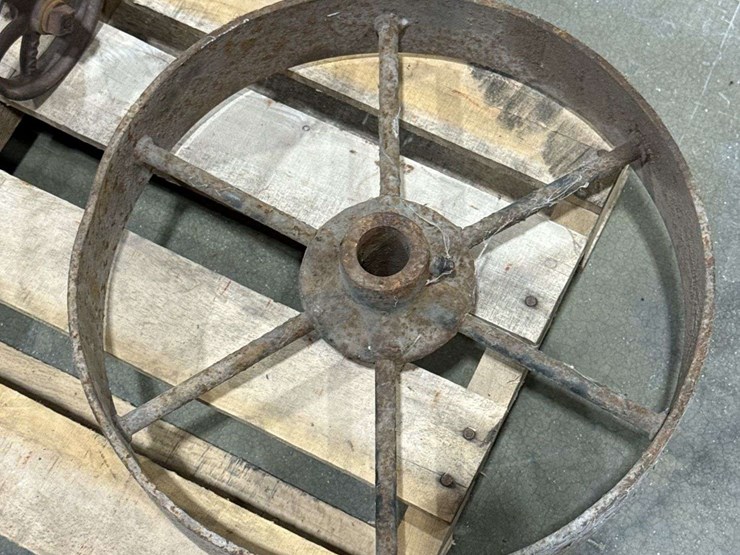 salvaged-cast-iron-wheels-of-varying-sizes-image-22