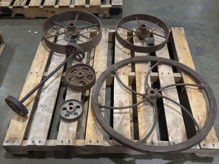 salvaged-cast-iron-wheels-of-varying-sizes-image-1