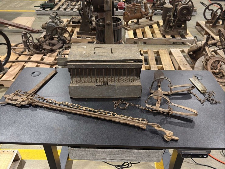 fence-and-trap.-three-traps-and-a-barb-wire-fence-stretcher.-image-1