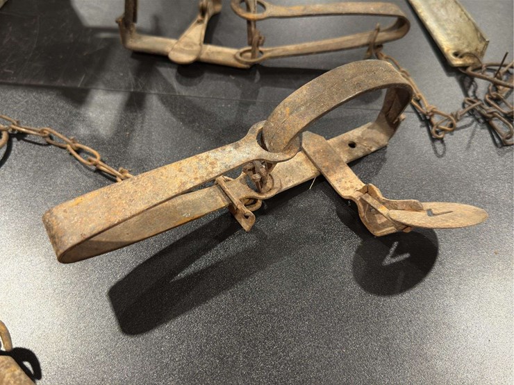 fence-and-trap.-three-traps-and-a-barb-wire-fence-stretcher.-image-8