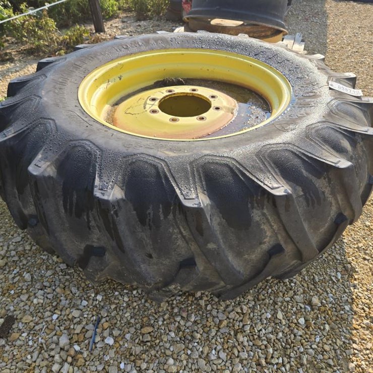 #3871 • 18.4 X 30 TIRE ON 8 BOLT RIM