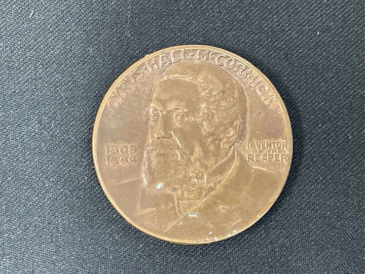 (2)-1931-centennial-of-the-reaper-coin-+-1909-ruler-image-2