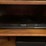 tv-stand-with-toshiba-dvd/vcr-player,-panasonic-blu-ray-player,-and-dvds-image-3