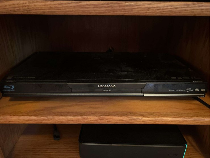 tv-stand-with-toshiba-dvd/vcr-player,-panasonic-blu-ray-player,-and-dvds-image-3