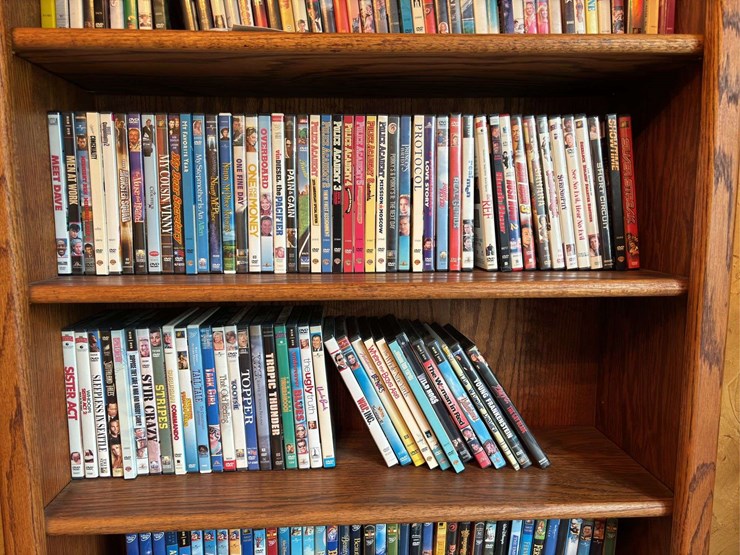 bookshelf-with-dvds---(assorted-dvd's)-the-shelf-is-82”-tall-by-36”-wide.-image-4
