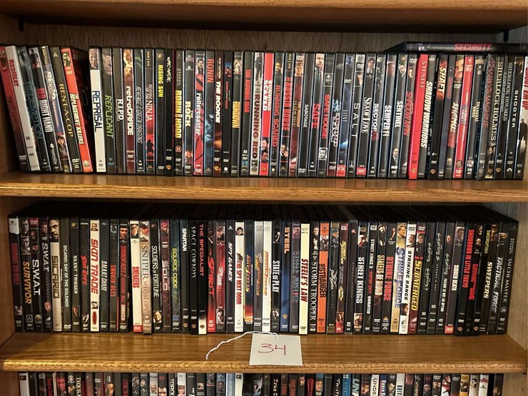 bookshelf-and-dvds,-sony-tv-dvds,-alphabetically-organized-m-through-v.-the-shelf-is-82”-tall-by-36”-wide.-image-3