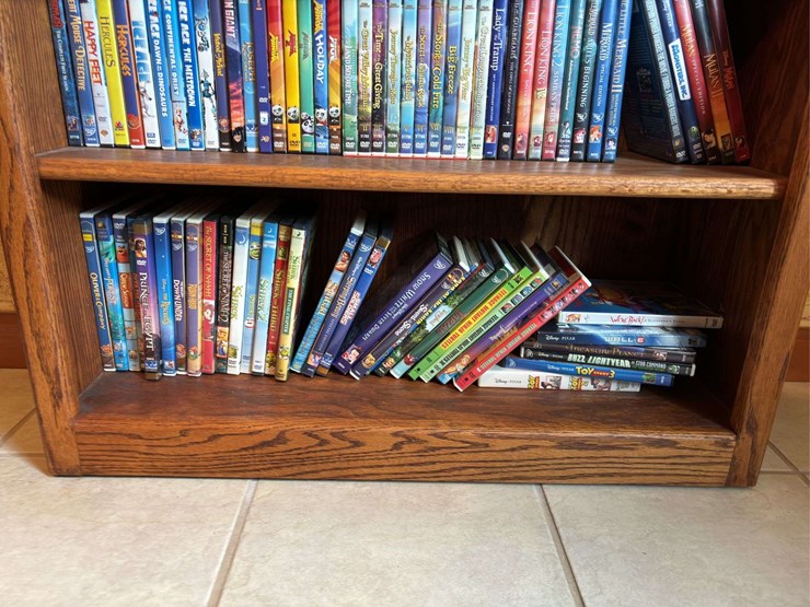 bookshelf-with-dvds---(assorted-dvd's)-the-shelf-is-82”-tall-by-36”-wide.-image-6