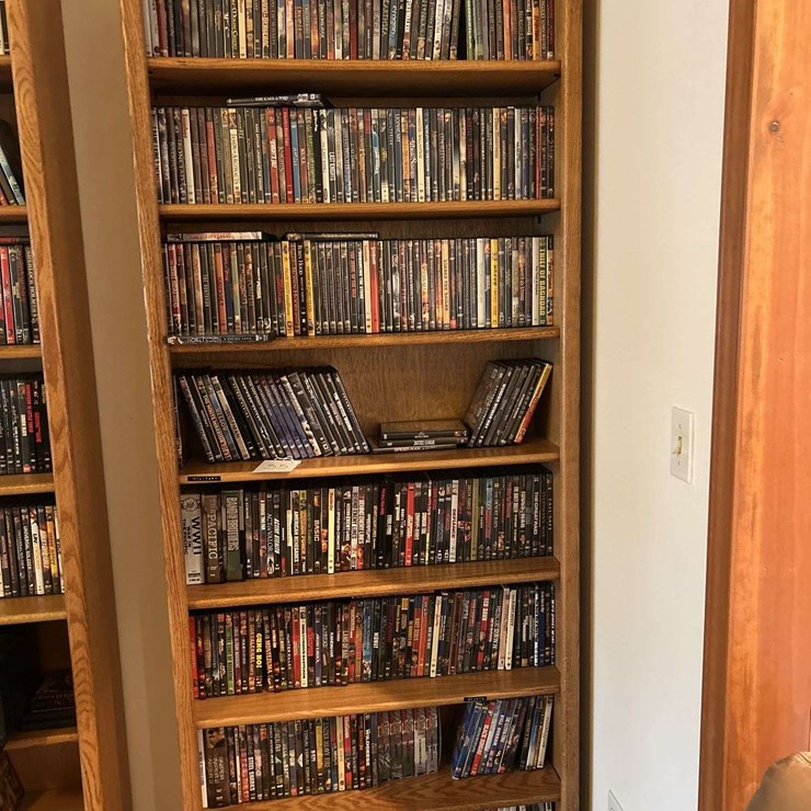 Bookshelf and DVDs - The shelf is 82” tall by 36” wide.