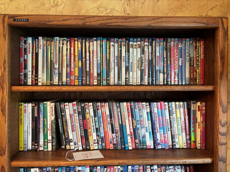 bookshelf-with-dvds---(assorted-dvd's)-the-shelf-is-82”-tall-by-36”-wide.-image-3