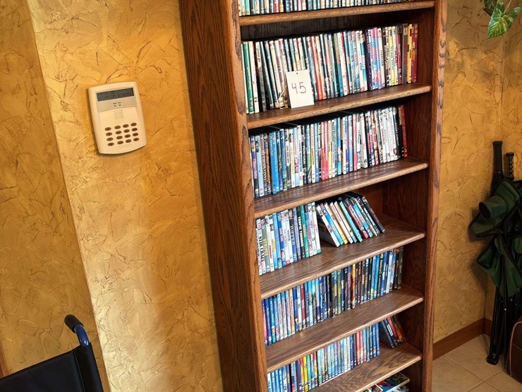 bookshelf-with-dvds---(assorted-dvd's)-the-shelf-is-82”-tall-by-36”-wide.-image-2