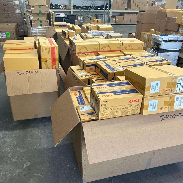 8 Bins and Approx. 86 Loose Boxes of OKI Printer Accessories