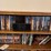 bookshelf-and-dvd’s,-small-boombox---(assorted-dvd's)-the-shelf-is-82”-tall-by-36”-wide.-image-2