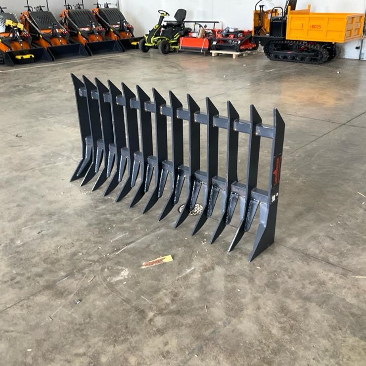#1407 • Unused Landhonor Skid Steer Root Rake Attachment