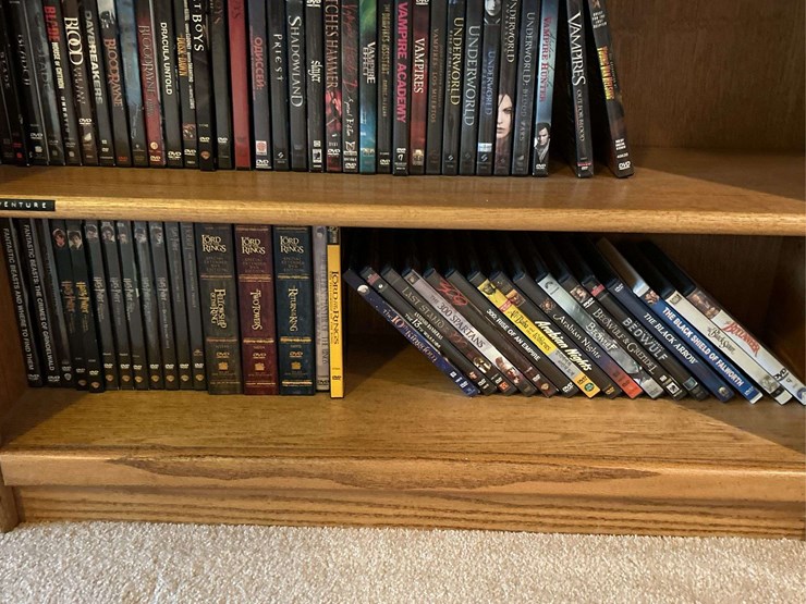 bookshelf-and-dvds,-sony-tv-dvds,-alphabetically-organized-m-through-v.-the-shelf-is-82”-tall-by-36”-wide.-image-5
