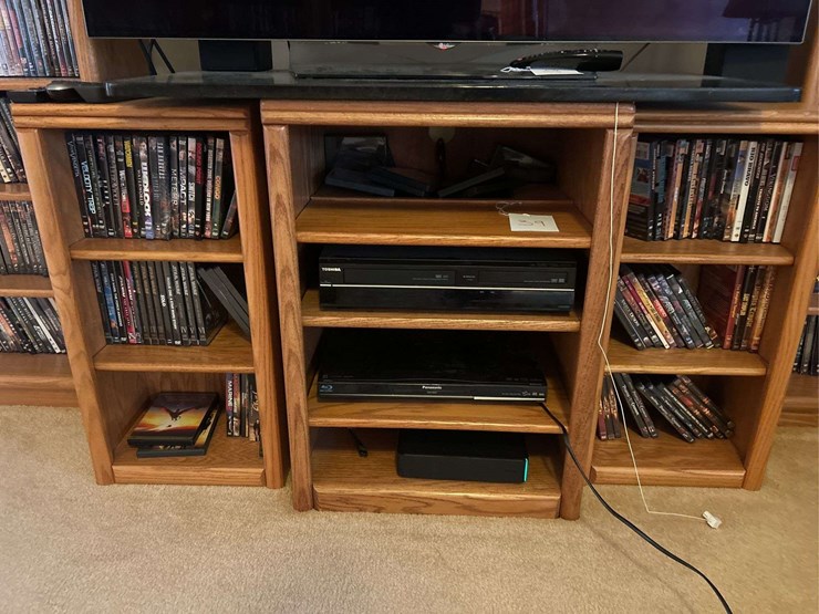 tv-stand-with-toshiba-dvd/vcr-player,-panasonic-blu-ray-player,-and-dvds-image-1