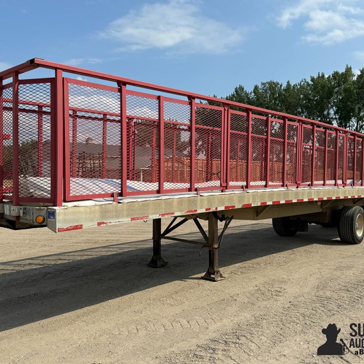 1995 Reitnouer T/A Spread Axle Side Dump Sugar Beet Trailer
