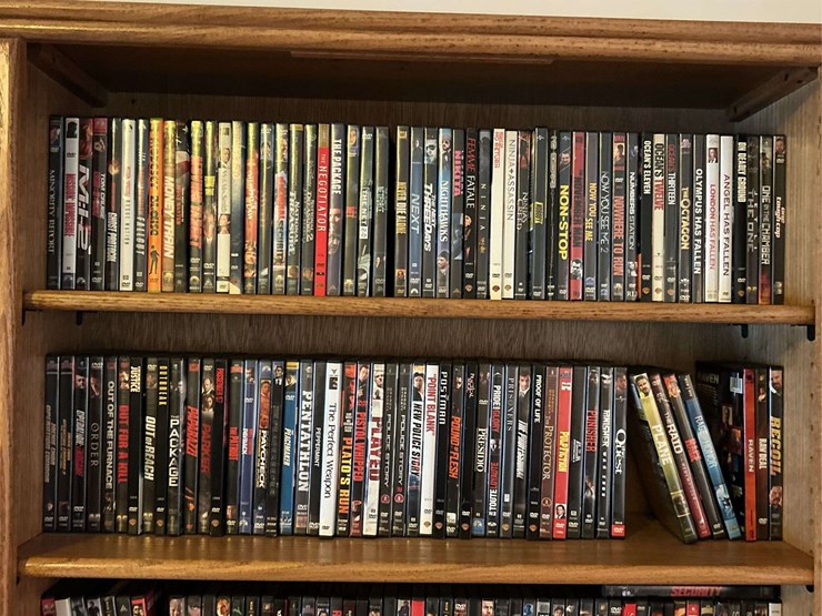 bookshelf-and-dvds,-sony-tv-dvds,-alphabetically-organized-m-through-v.-the-shelf-is-82”-tall-by-36”-wide.-image-2