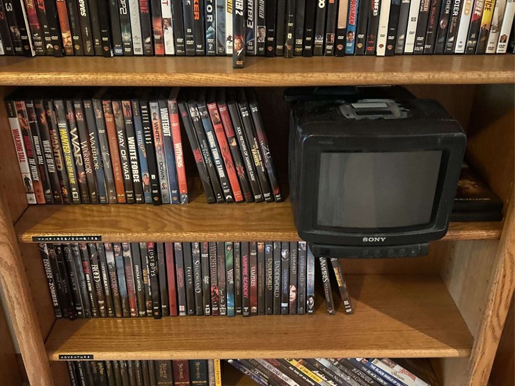 bookshelf-and-dvds,-sony-tv-dvds,-alphabetically-organized-m-through-v.-the-shelf-is-82”-tall-by-36”-wide.-image-4