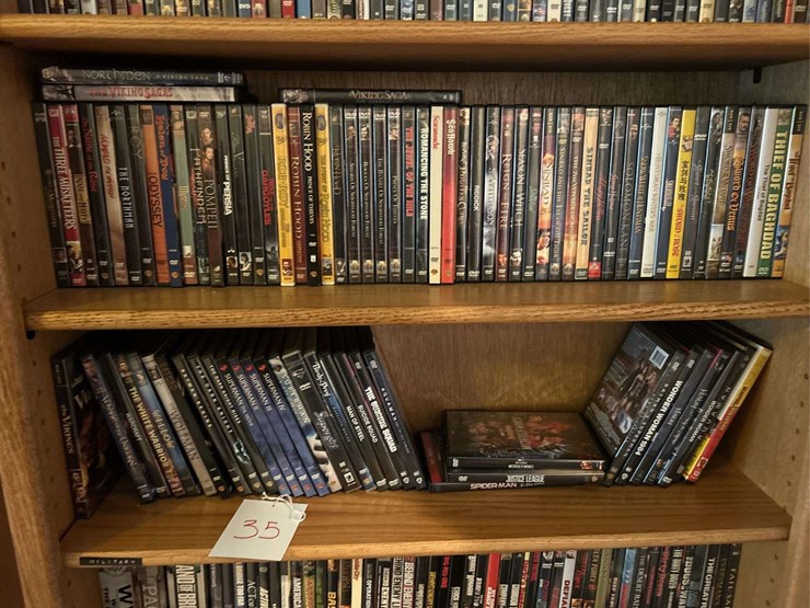 bookshelf-and-dvds---the-shelf-is-82”-tall-by-36”-wide.-image-3