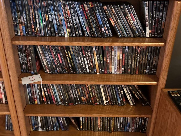bookshelf-and-dvd’s-(assorted-dvd's)-the-shelf-is-82”-tall-by-36”-wide.-image-1
