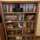 bookshelf-and-dvd’s,-small-boombox---(assorted-dvd's)-the-shelf-is-82”-tall-by-36”-wide.-image-1