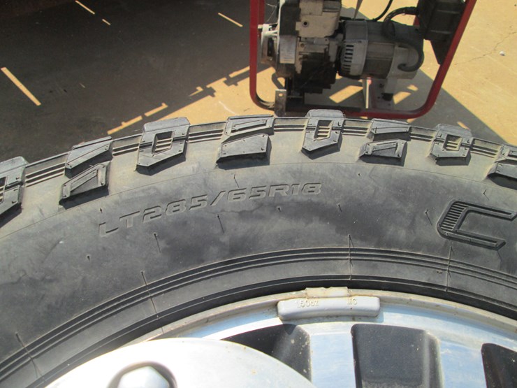 #52-•-#26826-•-lot-of-(4)-cooper-285/65r18-tires-&-ford-wheels-image-6