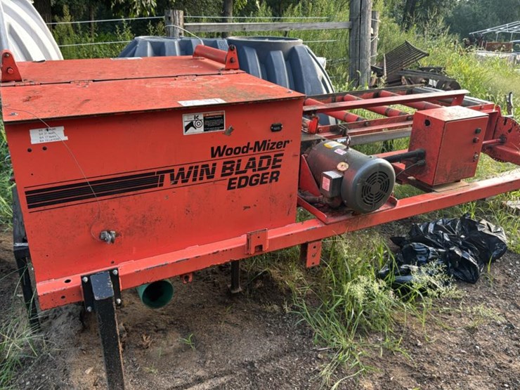 #130-•-2000-wood-mizer-200-twin-blade-edger-image-1
