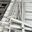 commercial-grade-shelving,-winning-bidder-takes-everything-pictured.-note:--shelves-are-￼-piled-two-deep.-image-4