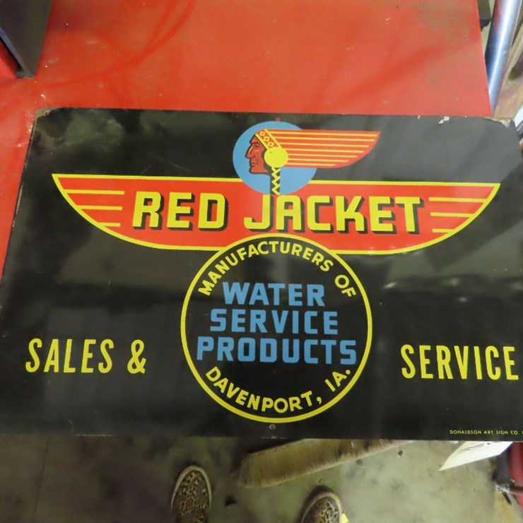 Red jacket Sales and Service Sign