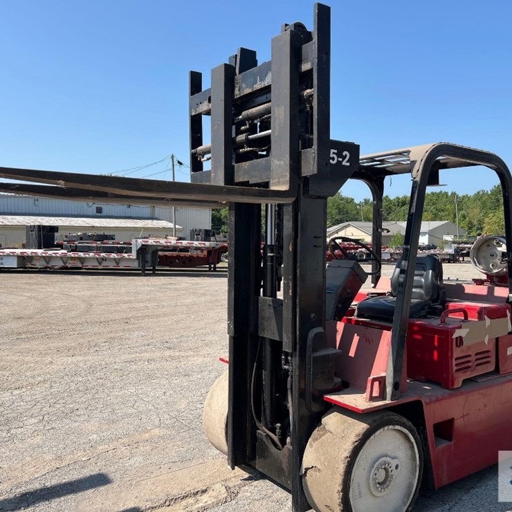 CAT 15000# model 150D5 propane forklift. Forks: 5' long by 6" wide by 2-1/2" thick. Lifting height