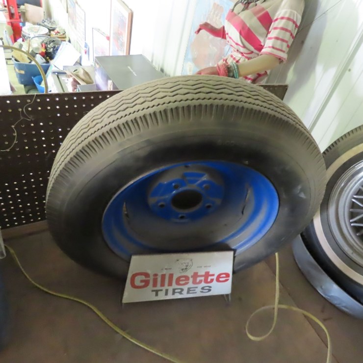 Gilette Tires Stand with Tire