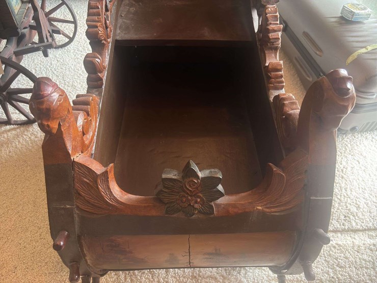 sled-with-ornate-painting-image-11