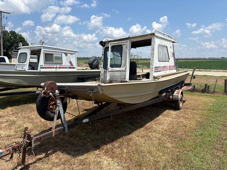 #79-•-#25996-•-search-&-rescue-boat-w/40hp-johnson-outboard-motor-&-trailer-image-1