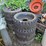 a-group-of-ass't-skidsteer-and-excavator-wheels-image-1