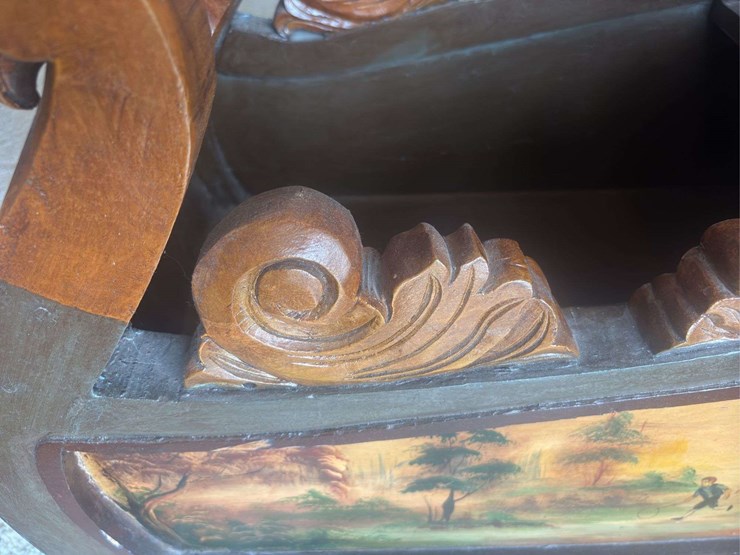sled-with-ornate-painting-image-10