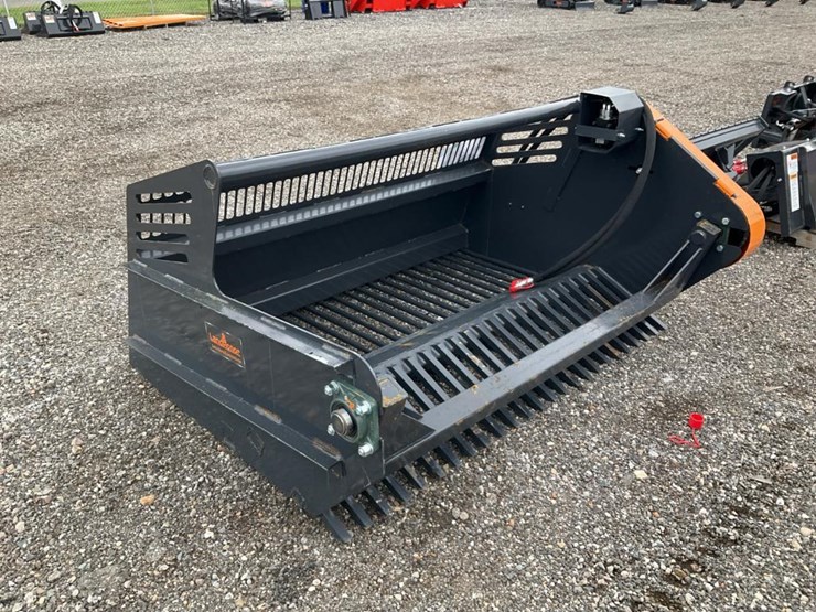 #1411-•-new-skid-steer-rock-picker-image-1