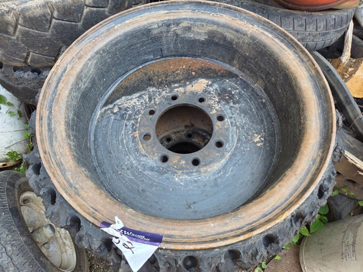 a-group-of-ass't-skidsteer-and-excavator-wheels-image-2