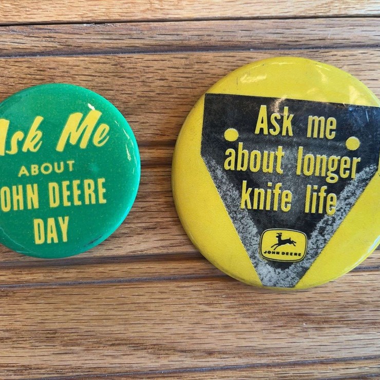 (2) John Deere Buttons