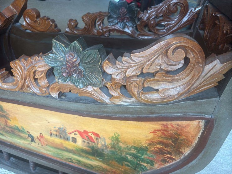 sled-with-ornate-painting-image-9